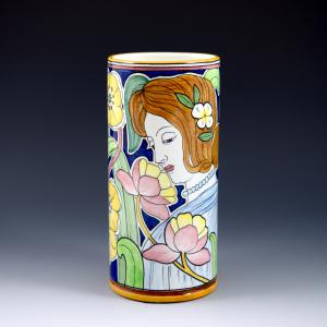 Vaso cilindrico con profilo femminile e fiori